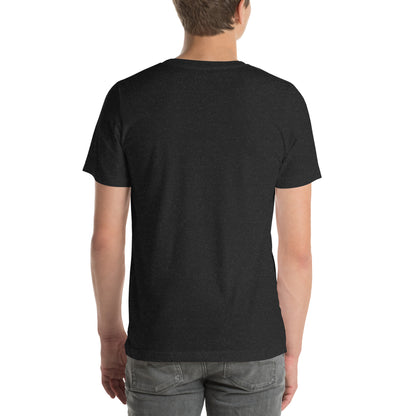 A person is shown from the back, wearing a NeuroNiche Design "OCD Is Not An Adjective" short-sleeve black t-shirt and gray jeans, standing against a white background.