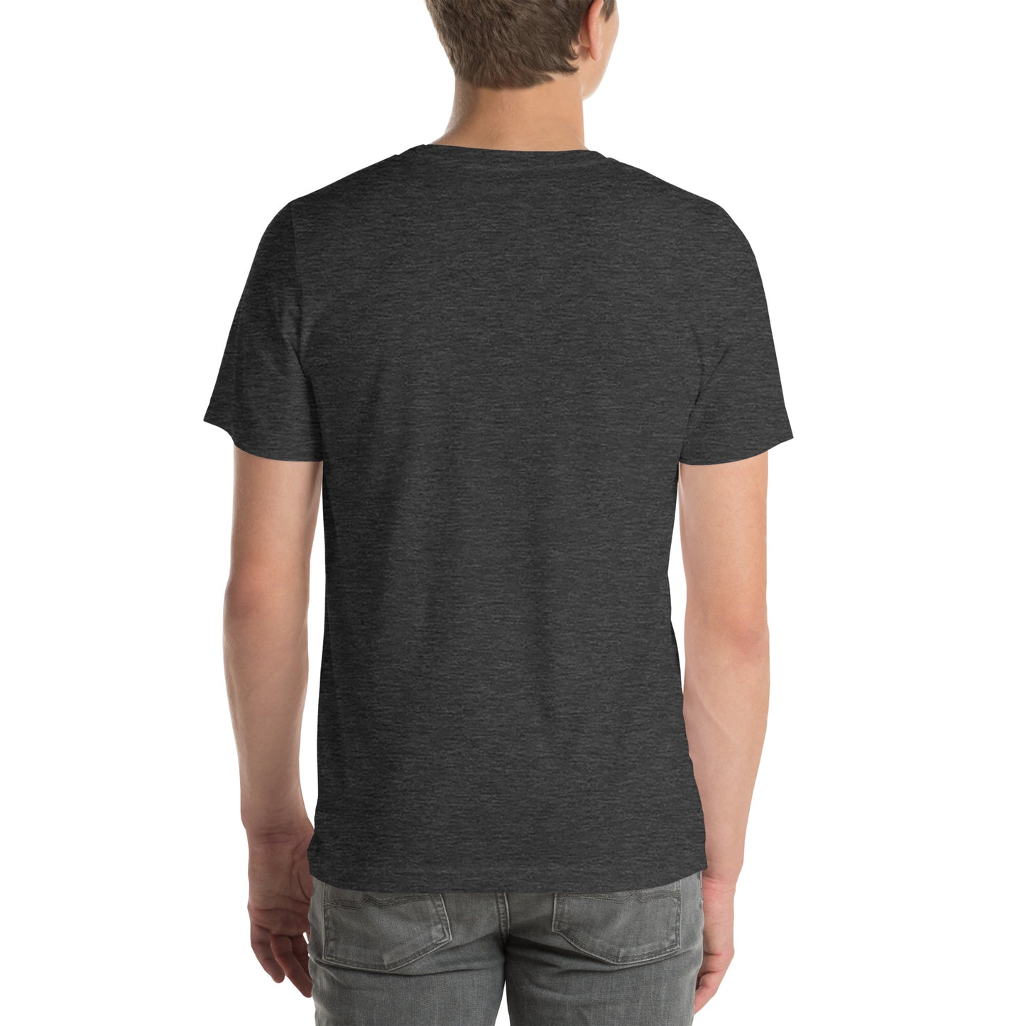 A person with their back to the camera wears a NeuroNiche Design "OCD Is Not An Adjective" t-shirt in plain dark gray combed cotton and light gray jeans. The background is white and uncluttered.